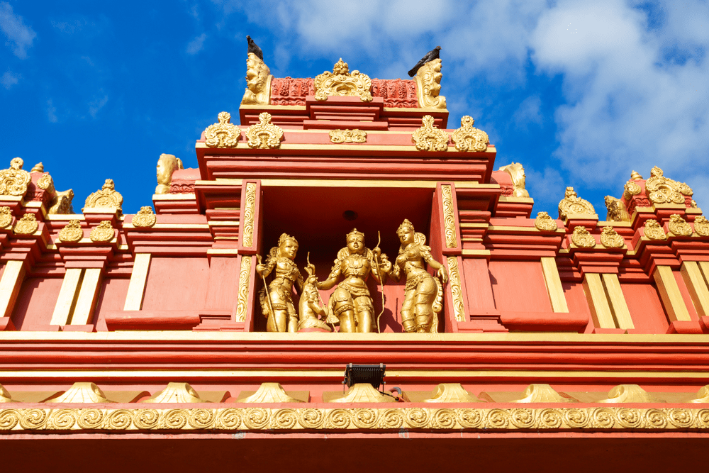 Seetha Amman Kovil Hindu temple in Nuwara Eliya Sri Lanka with traditional architecture and mountain backdrop
