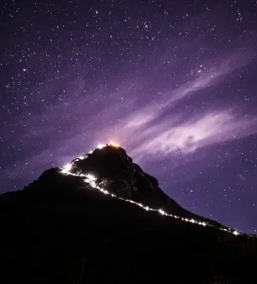 Dramatic night view of a mountain peak, featured by Islandwyde Travel Agents in Colombo, Sri Lanka for outdoor exploration